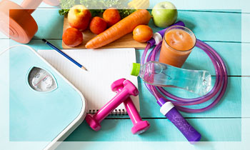 Happy latin mom and little daughter outside.